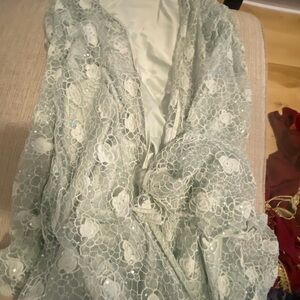 Elegant Laced soft green Abaya with a floral pattern 😍